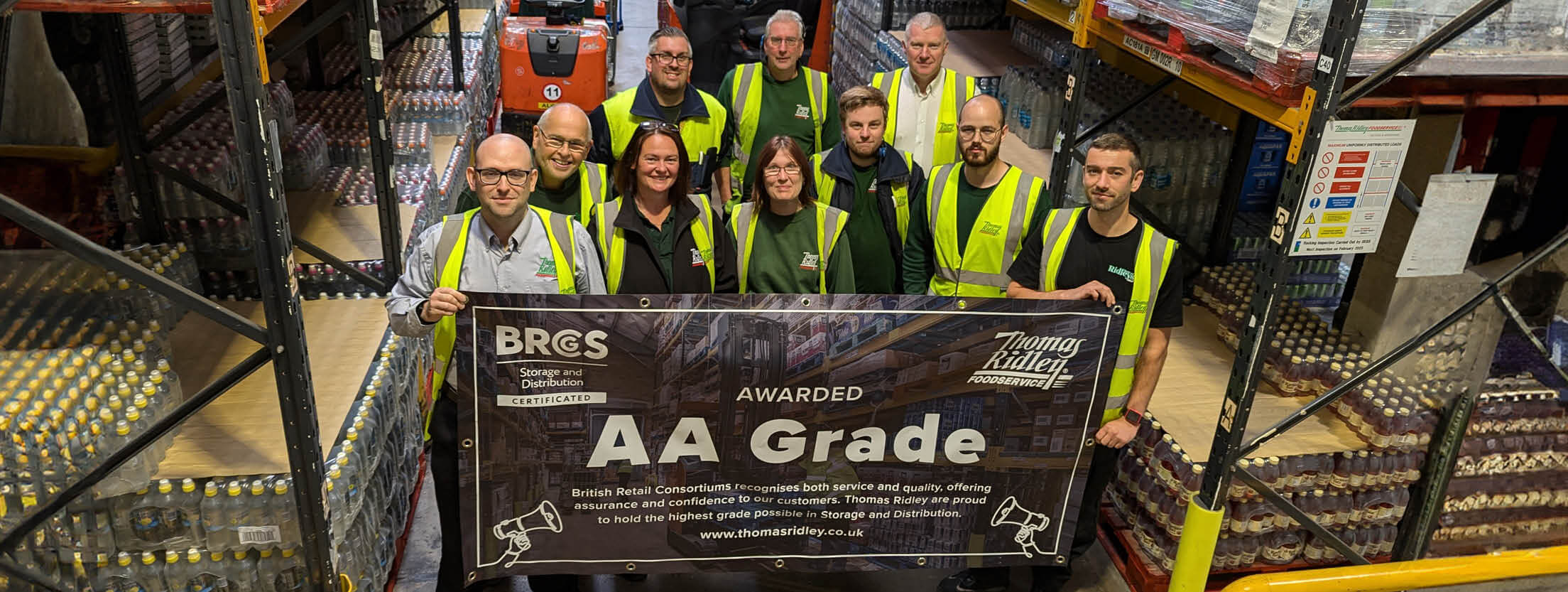 Warehouse Operations team Holding AA Grade rating Banner